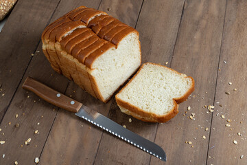 Loaf Bread Slices on a Wooden Desk
