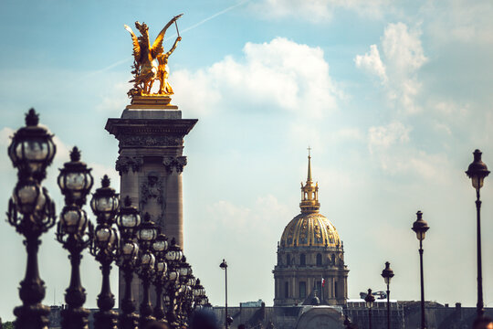 Alexandre III Bridge and Hotel Des Invalides against sky in city