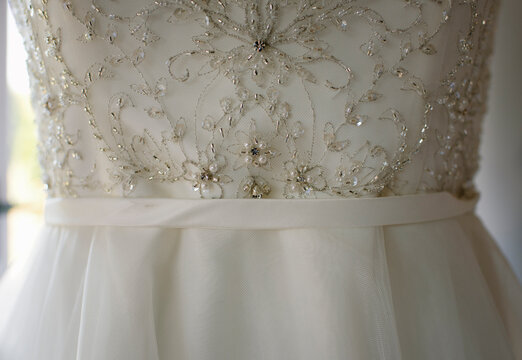 Close-up Of Wedding Dress At Home