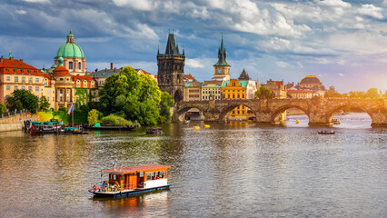 Naklejka premium Charles Bridge sunset view of the Old Town pier architecture, Charles Bridge over Vltava river in Prague, Czechia. Old Town of Prague with Charles Bridge, Prague, Czech Republic.