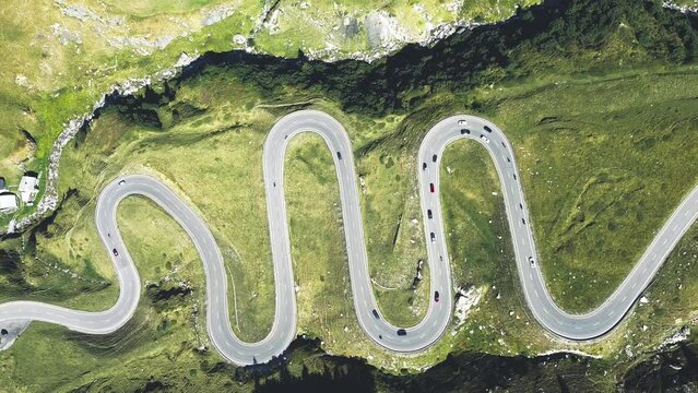 road transportation technology, mobility concept of traffic through the swiss alps, julierpass pass street, shot with drone