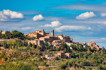 Village of Montepulciano with wonderful architecture and houses. A beautiful old town in Tuscany, Italy. Aerial view of the medieval town of Montepulciano, Italy - obrazy, fototapety, plakaty