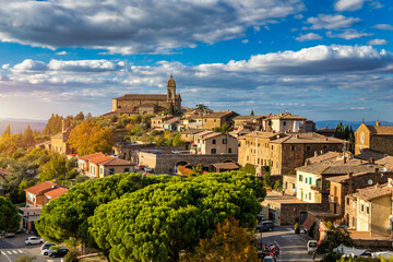 Fototapeta na wymiar View of Montalcino town, Tuscany, Italy. Montalcino town takes its name from a variety of oak tree that once covered the terrain. View of the medieval Italian town of Montalcino. Tuscany