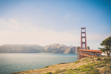Golden Gate Bridge over San Francisco Bay against sky during sunny day