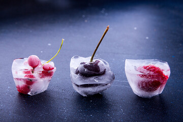 Close-up of frozen berries on table