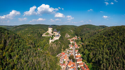 Royal Castle Karlstejn. Central Bohemia, Karlstejn village, Czechia. Aerial view to The Karlstejn...