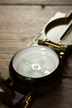 Close-up of navigational compass on table