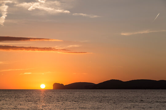 Scenic view of sea against romantic sky during sunset