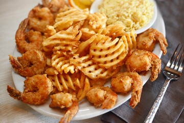 High angle view of fried food with rice served in plate on table