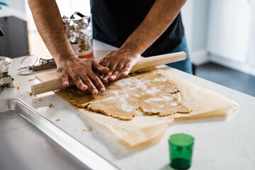 Dad preparing Christmas cookie dough