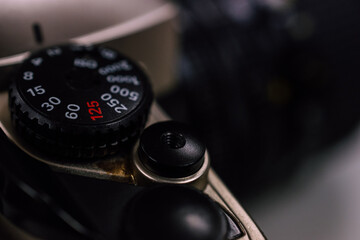 Vintage photography shutter speed gear with blurred space