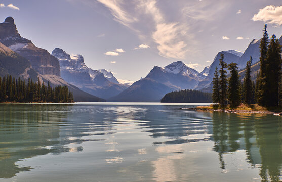 Scenic view of Maligne lake against sky at Jasper National Park at mor