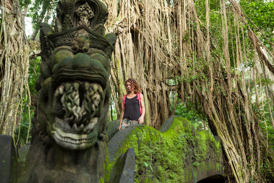 Caucasian tourist girl in the monkey forest of Ubud Bali
