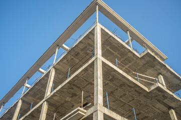 Construction site of a new apartment building. Concre structure on cor