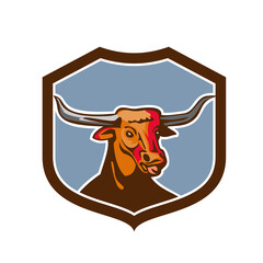 Illustration of a texas longhorn red bull head tongue out set on inside shield crest on isolated background done in retro style.