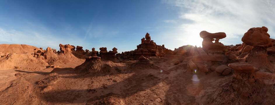 Red Rock Formations in Desert at Sunny and cloudy Sunrise sky. Spring Season. Goblin Valley State Park. Utah, United States. Nature Background Panorama © edb3_16