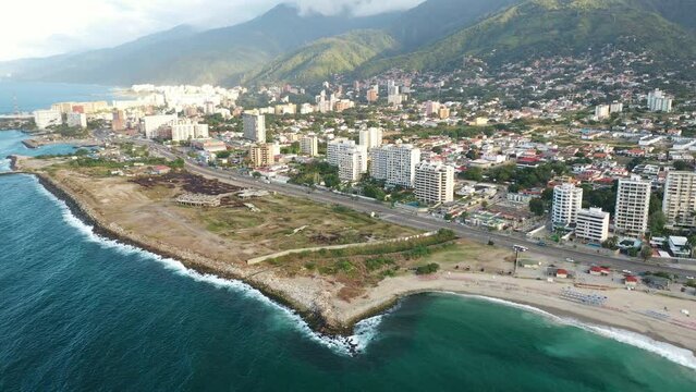 Aerial view picturesque public beach with turquoise water. Los Corales, La Guaira, Venezuela.