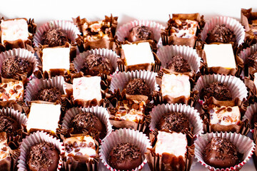 assorted chocolate brownies on white