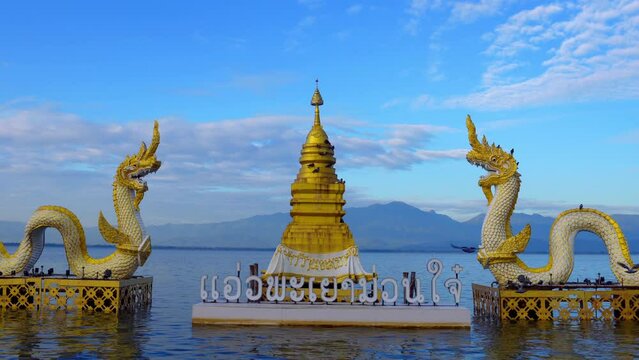 Serpent statue Phayao Province landmarks are popular to release birds and fish to make merit.