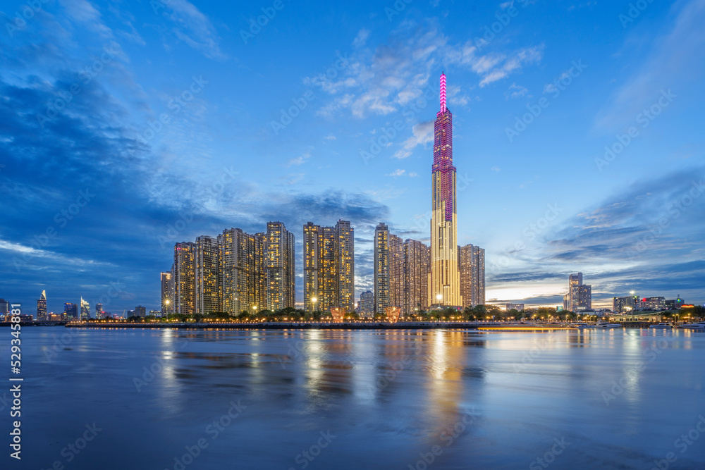 Wall mural ho chi minh city by the river. landmark 81 is the tallest building in vietnam