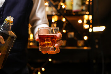 Bartender pouring Whiskey, on  bar,