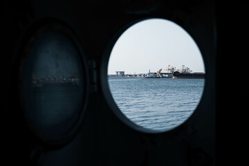 the port of Constanta. The port of Constanta seen through the window of a ship.