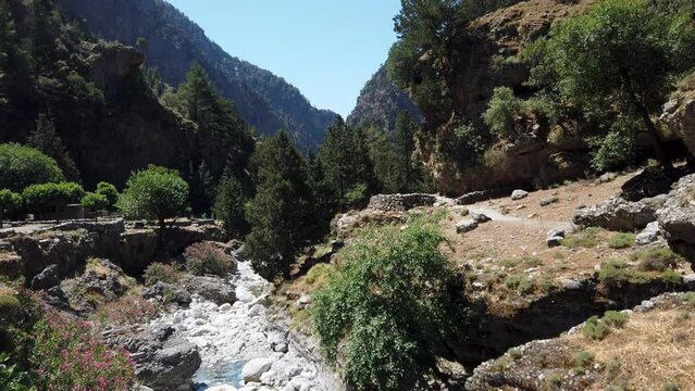 Traveling camera movement through natural landscape of Samaria Gorge