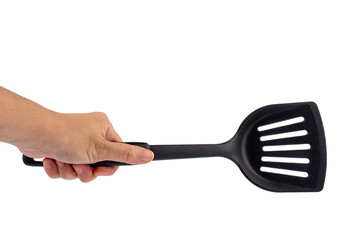 Hand holding kitchen utensils on transparent background