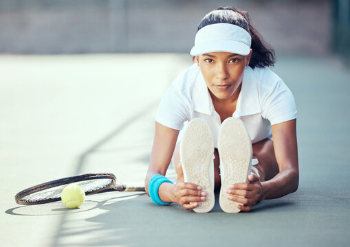 Tennis, Sport And Exercise With A Woman Stretching To Warmup Before A Game Or Match On An Outdoor Court. Health Fitness And Sports With A Female Player Getting Ready For A Workout And Practice