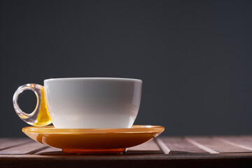 close cup of coffee against gray with copy space