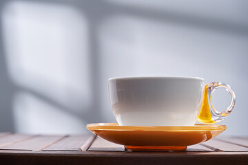 close cup of coffee with  window light