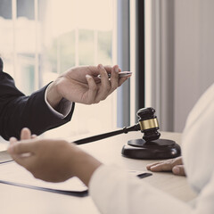 Attorneys or consultants work in the courtroom and negotiate with clients or complainants who want justice in corporate fraud cases, Litigation and justice concept.