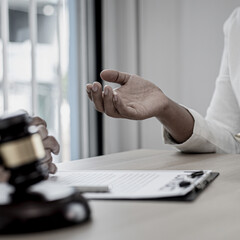 Attorneys or consultants work in the courtroom and negotiate with clients or complainants who want justice in corporate fraud cases, Litigation and justice concept.