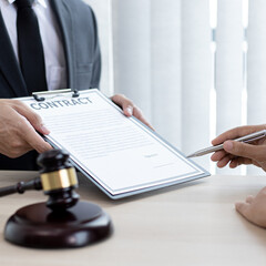 Attorneys or consultants who work in the courtroom are currently investigating the company's corruption cases and have their clients sign legal confirmation, Litigation and justice concept.