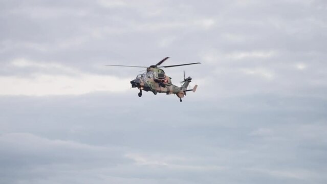 Military ARH Helicopter Pilot Salutes Through Windshield At Brisbane City Riverfire Festival, 4K Slow Motion