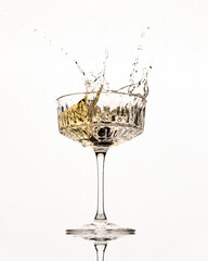 Alcohol cocktail with splash of berries isolated on white background