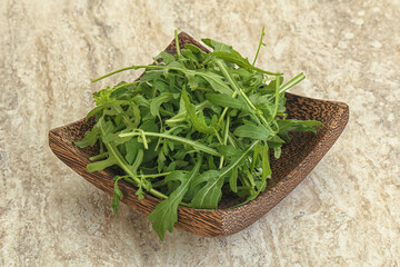 Fresh green arugula in the bowl