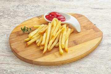 French fried potato over board