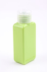 the bottle green color packaging isolated on white background