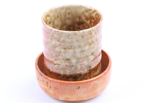Asian ceramics tea cups on white background