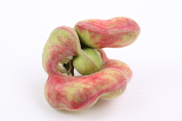 manila tamarind fruit on white background