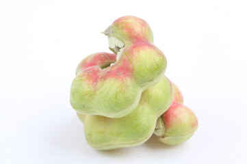manila tamarind fruit on white background