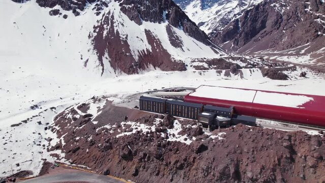 Snow Rocky Mountains With Customs Los Libertadores In Las Condes, Valpara&iacute;so, Chile. Aerial Shot