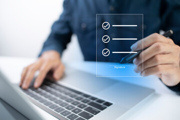 Fototapeta premium Businessman, work from home, handling documents, E-signing, signing digital contracts electronic signing electronic signature through internet technology document data management smart contract