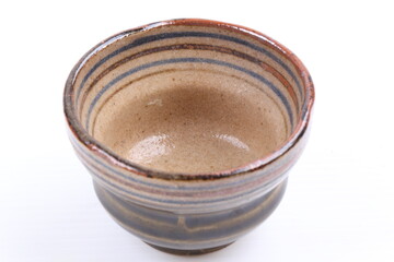 Asian ceramics tea cups on white background