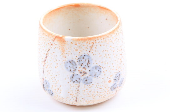 Asian ceramics tea cups on white background