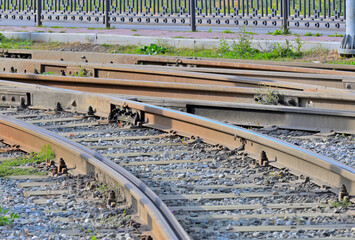 Tram tracks at the turn on an autumn day