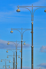 Street lighting lanterns on an autumn day