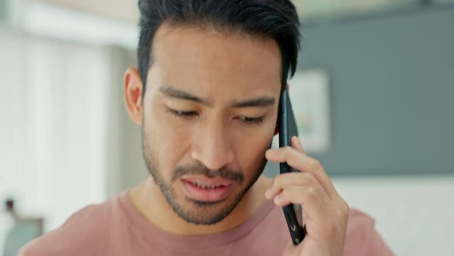 Phone, call and stress with a man talking on his mobile and feeling sad, upset or unhappy in his home. Debt, frustrated and annoyed with a young male having trouble with news of a financial crisis