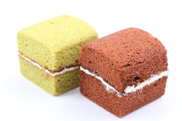 Brownie cheese cake and green tea cake on white background
